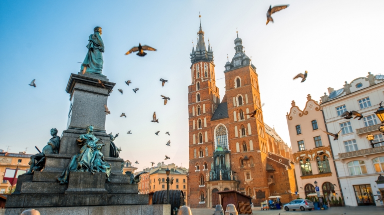 A church and statue in Krakow