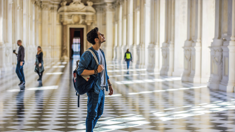 young-man-visiting-museum