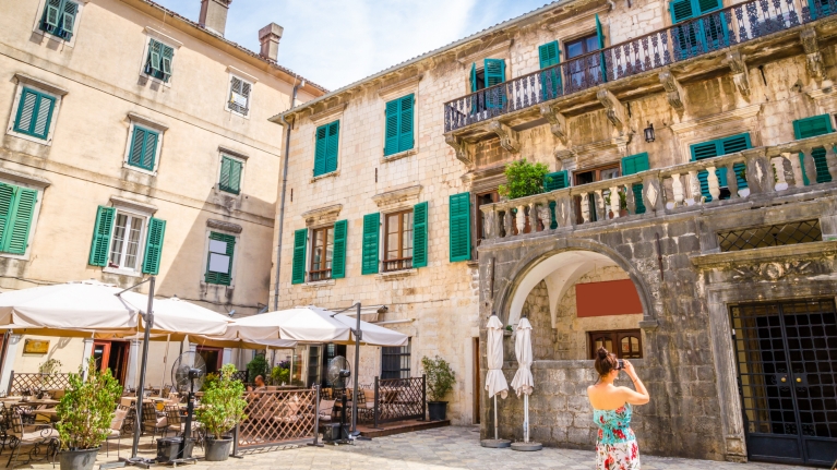 montenegro-kotor-old-town-woman-taking-pictures